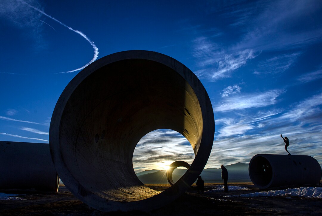 (Rick Egan | The Salt Lake Tribune)  Revelers celebrate a unique winter solstice near at the famed Sun Tunnels sculpture in remote Utah's Great Basin Desert, on Monday, Dec. 21, 2020. For the first time in 800 years, Saturn and Jupiter align to create a single, bright point of light known as the "Christmas Star."