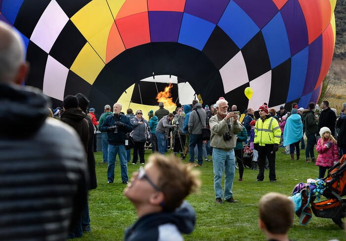(Scott Sommerdorf | The Salt Lake Tribune)
Spectators take in the various launches at the 4th annual Autumn Aloft Hot Air Balloon Festival in Park City, Sunday, September 17, 2017.