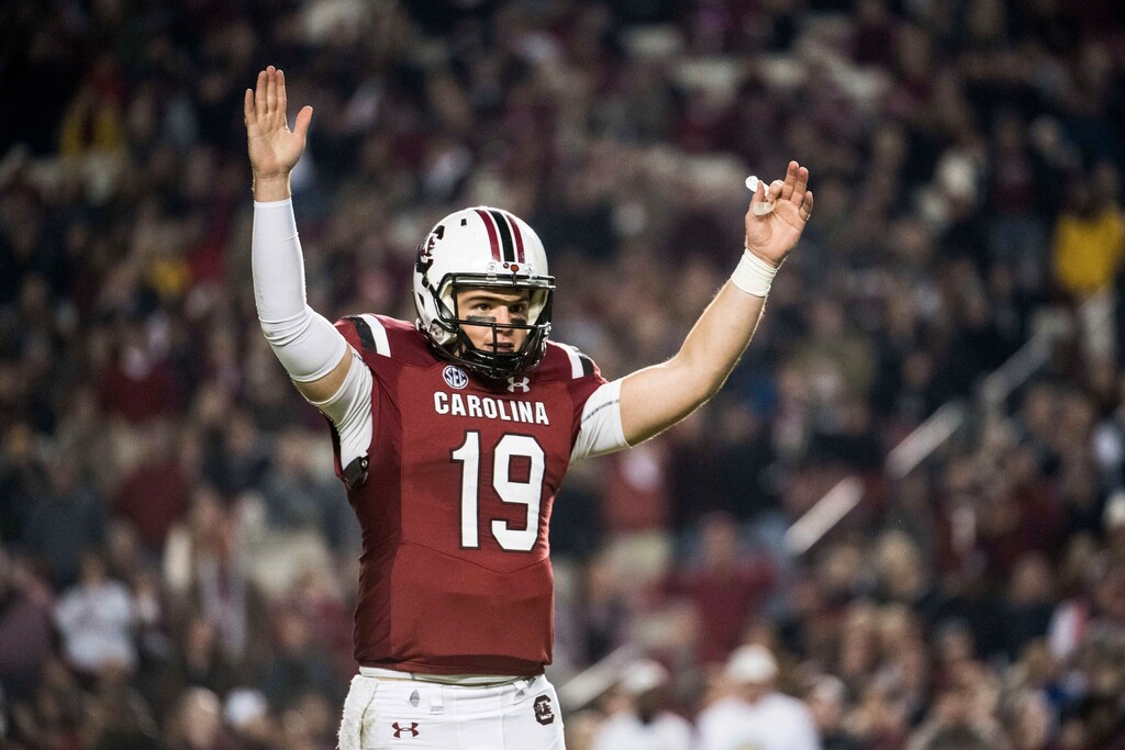 (AP Photo/Sean Rayford) Graduate transfer quarterback Jake Bentley (19), shown celebrating a South Carolina touchdown in 2018, has committed to Utah as part of the 2020 signing class that mostly will be completed this week.