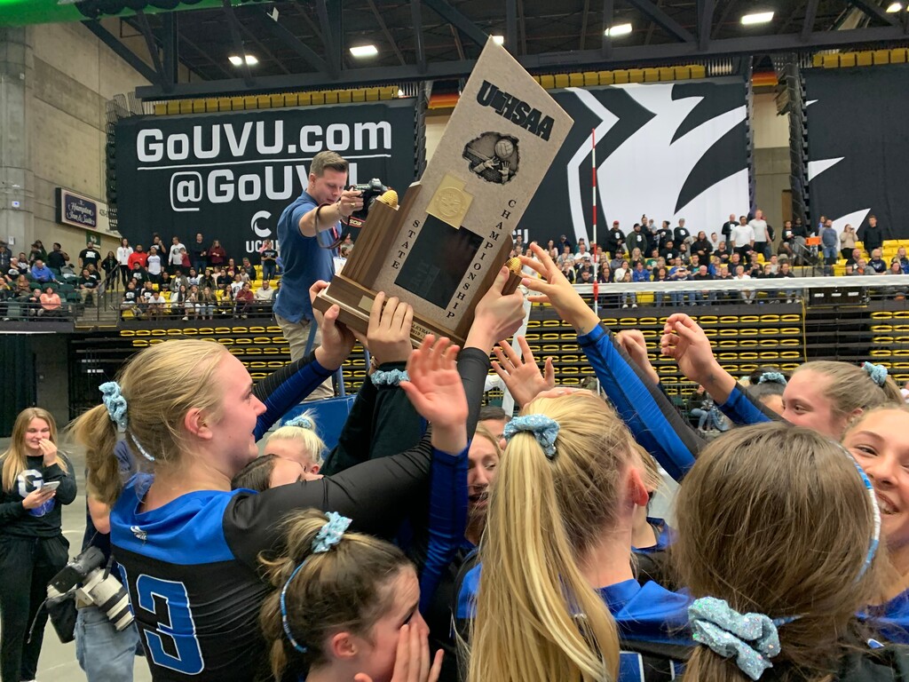 (Alex Vejar | The Salt Lake Tribune) The Pleasant Grove girls volleyball team celebrates winning the 6A state championship after beating Copper Hills 3-1 Saturday, Nov. 9, 2019 at Utah Valley University in Orem, Utah.