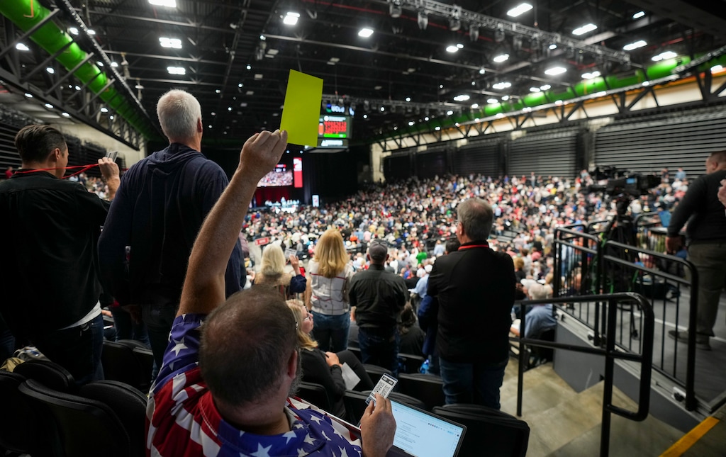 (Bethany Baker  |  The Salt Lake Tribune) A delegate votes by holding up his card during the State Organizing Convention for the Utah Republican Party at Utah Valley University in Orem on Saturday, May 17, 2025.