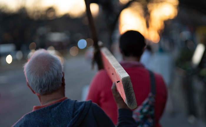 (Francisco Kjolseth | The Salt Lake Tribune) Nails protrude from a wood cross as Utah Christians walk the streets of Salt Lake City beginning at Cathedral of the Madeleine on Good Friday, to symbolically mark Jesus' carrying the cross to his crucifixion, April 2, 2021.