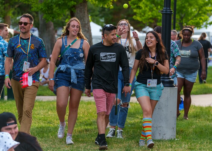 (Leah Hogsten | The Salt Lake Tribune)  Pride festival revelers enjoy the Utah Pride Festival at Washington Square, Saturday, June 4, 2022. 