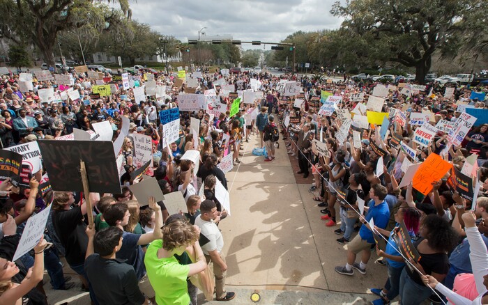 Students gather on the steps of the old Florida Capitol protesting gun violence in Tallahassee, Fla., Wednesday, Feb. 21, 2018.   Students at schools across Broward and Miami-Dade counties in South Florida planned short walkouts Wednesday, the one week anniversary of the deadly shooting at Marjory Stoneman Douglas High School. (AP Photo/Mark Wallheiser)