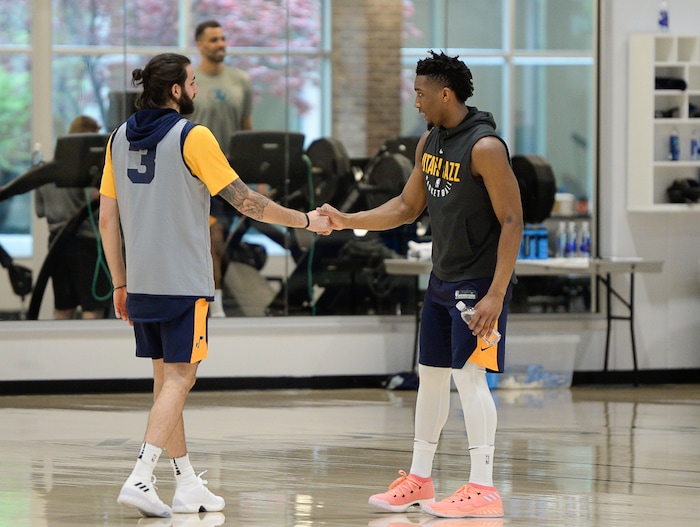 (Francisco Kjolseth  |  The Salt Lake Tribune)  Ricky Rubio and Donovan Mitchell of the Utah Jazz wrap up a long practice on Friday, April 20, 2018, ahead of Game 3 vs. Thunder on Saturday.