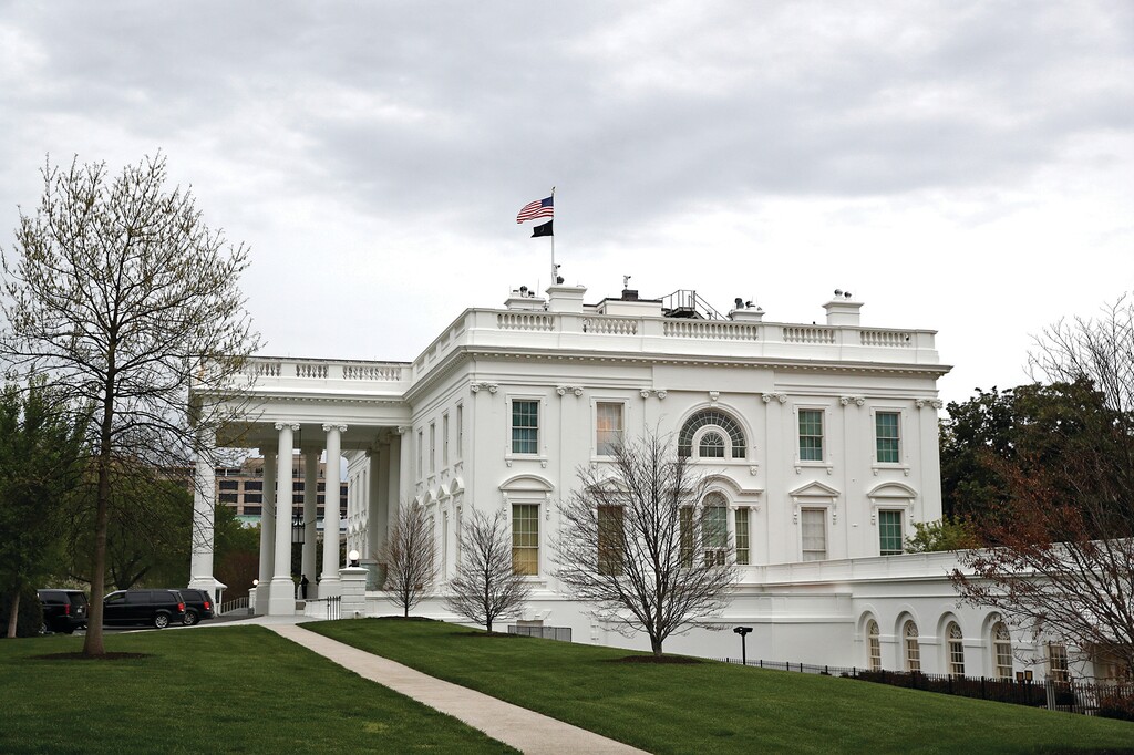 Clouds roll over the White House on April 12, 2020, in Washington. (AP Photo/Patrick Semansky)