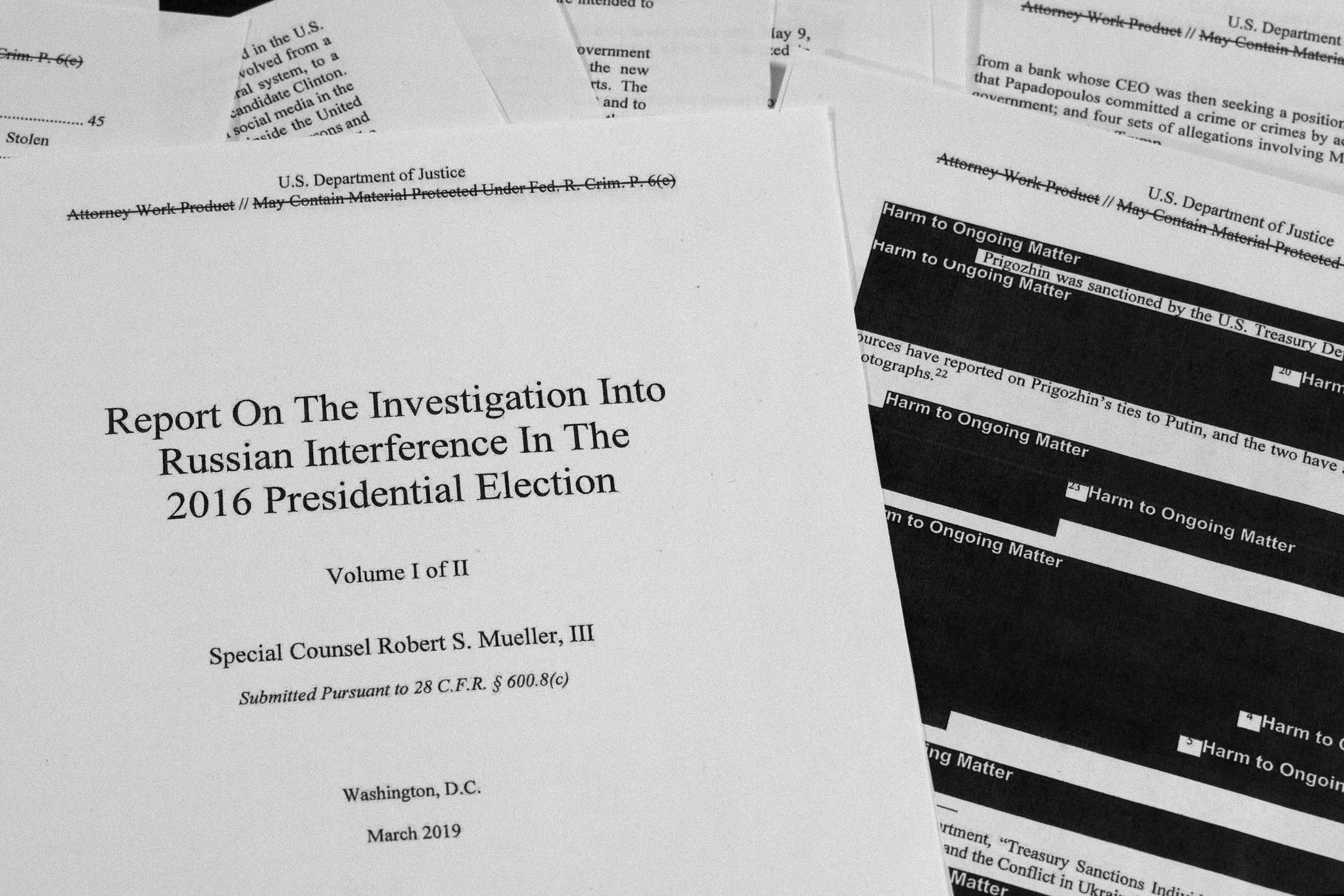 FILE - In this April 18, 2019, file photo, special counsel Robert Mueller's redacted report on Russian interference in the 2016 presidential election is photographed in Washington. The Mueller Report is no longer just a book or a document to read online. It is a work of theater and other art forms, and a touchstone for Trump opponents seeking to highlight the president’s alleged misconduct, including attempts to impede or halt the Russia investigation. (AP Photo/Jon Elswick, File)