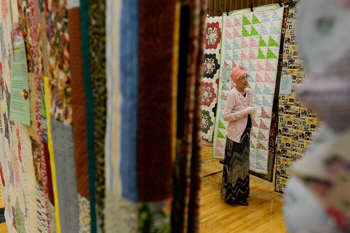 (Francisco Kjolseth  |  The Salt Lake Tribune)  Nacele Hart overlooks her more than 100 quilts and numerous sewing projects created over a 10-year period for her children, grandchildren and great-grandchildren. On Friday at a church in Orem her family put them on display with plans to hand them out Saturday to her loved ones. She's also currently battling cancer.