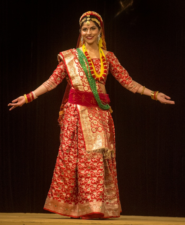 (Rick Egan  |  The Salt Lake Tribune)   Anju Sharma models an outfit from Nepal, at the 8th Annual Women of the World Fashion Show. The fashion show fund is raiser for the non-profit that seeks to help refugees settle in a new culture. Wednesday, March 7, 2018.