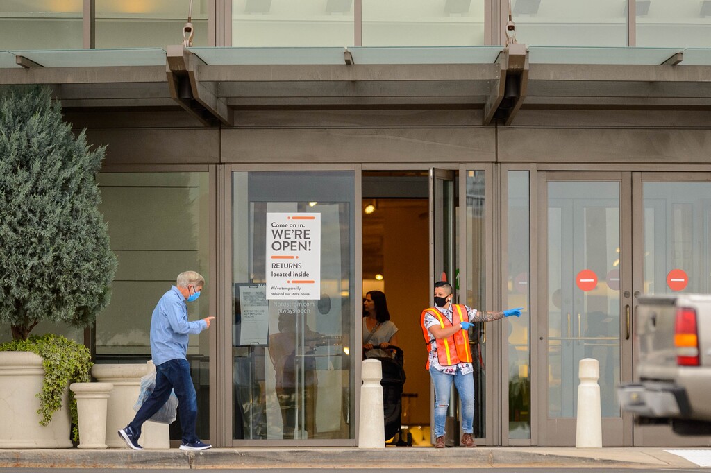 (Trent Nelson  |  The Salt Lake Tribune) A shopper is directed to the entrance at Nordstrom in Murray on Friday, May 22, 2020.
