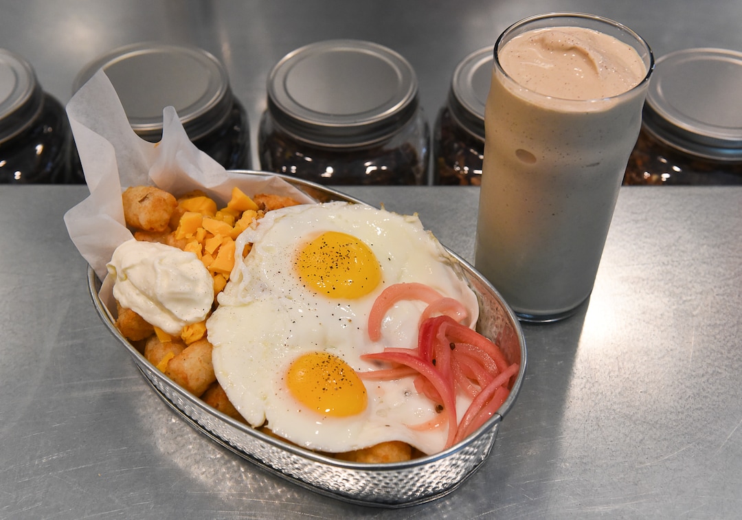 (Francisco Kjolseth  |  The Salt Lake Tribune)  Publik Ed's menu includes an upscale version of the "gawdawful" breakfast, once served at Big Ed's. The new version is served all day with baked tater tots, house-made chili, pickled onion, cheese and two eggs. Also featured is the two shot espresso milkshake.