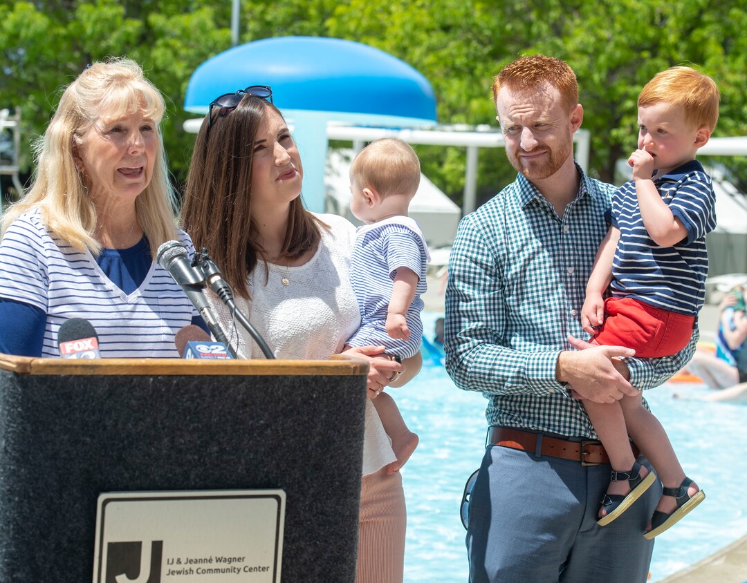 (Rick Egan  |  The Salt Lake Tribune)    Chris Miles talks about how she nearly lost her 2-year-old grandson Nathan Miles, to an accidental drowning, as her daughter Allie, grandson sam, along with Todd Miles and Nathan Miles listen, during a news conference at the Jewish Community Center to promote summer water safety, Friday May 31, 2019