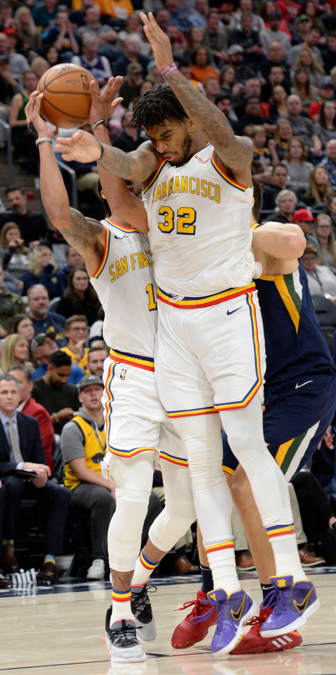 (Leah Hogsten  |  The Salt Lake Tribune) Golden State Warriors guard Damion Lee (1) and Golden State Warriors forward Marquese Chriss (32) collide on the court as the Utah Jazz defeated the Golden State Warriors, 114-106, Dec. 13, 2019 at Vivint Arena.