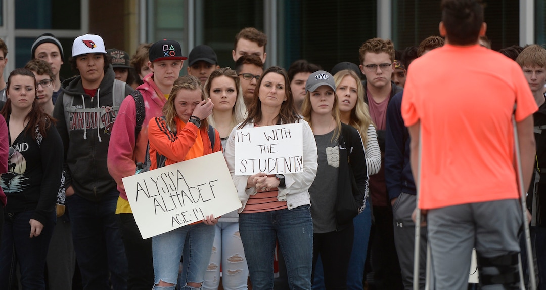 (Al Hartmann  |  The Salt Lake Tribune) 	About 80 students at Westlake High School in Saratoga Springs left class and stood together in silence at the front entrance of the school Wednesday March 14, 2018 to remember the 17 students who died in a school shooting in Florida.  They held posters of the names of those killed. 