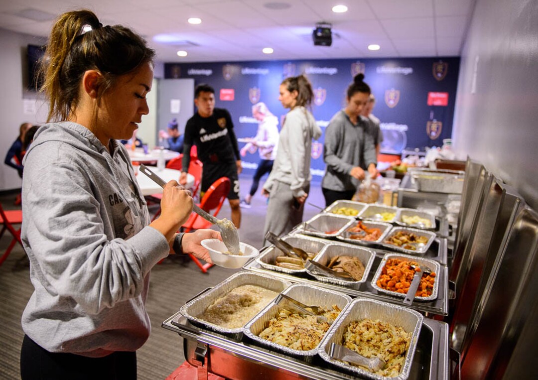 (Trent Nelson | The Salt Lake Tribune)Utah Royals midfielder Lo’eau LaBonta eats breakfast with teammates at Rio Tinto Stadium in Sandy, Friday April 6, 2018.