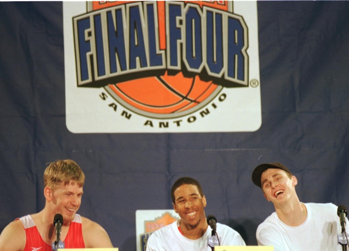 (Steve Griffin  |  Tribune file photo)  Mike Doleac, Andre Miller and Drew Hanson share a laugh at press conference following practice at the Alamodome during the 1998 Final Four championship in San Antonio, Texas.