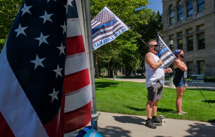 (Leah Hogsten | The Salt Lake Tribune) Supporters of law enforcement gather at Back the Blue rally, Saturday, August 15, 2020 at Washington Square.