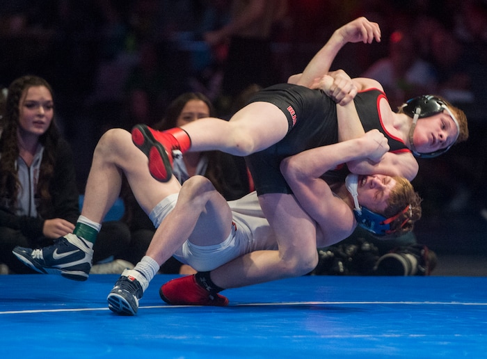 (Rick Egan  |  The Salt Lake Tribune)   Braydon Mogle (Mountain Crest) wrestles Scott Robertson (Bear River)  in the 113 weight class, in the 4A State Wrestling Championships, at UVU in Orem, Saturday, February 10, 2018.