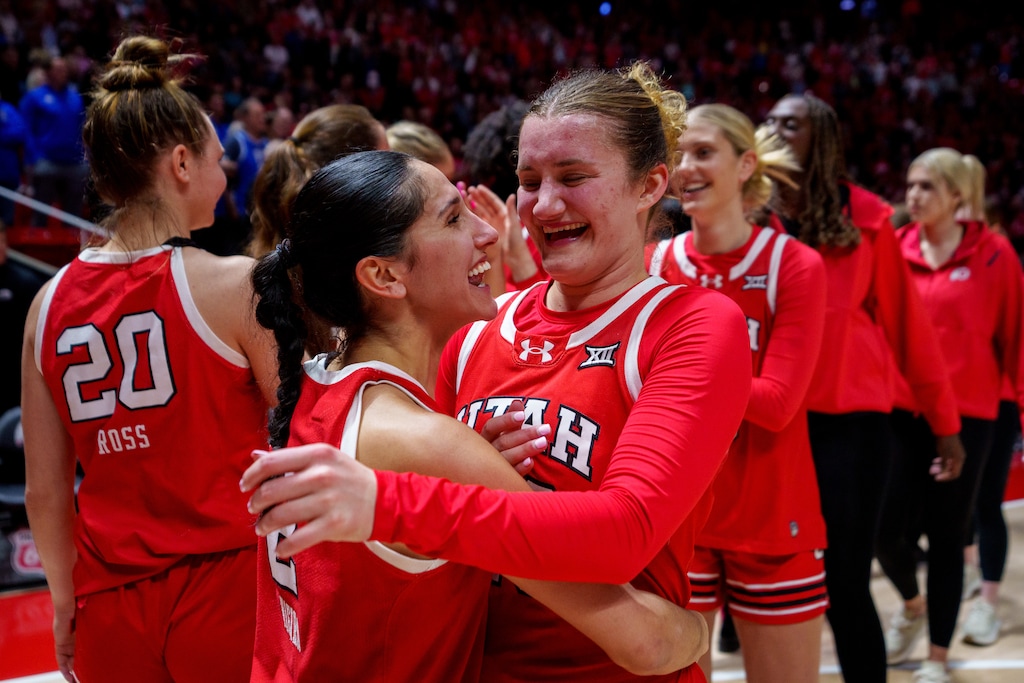 (Trent Nelson  |  The Salt Lake Tribune) Utah Utes guard Ines Vieira (2) and Utah Utes guard Matyson Wilke (23) celebrate Wilke's game-winning shot as Utah hosts BYU, NCAA basketball in Salt Lake City on Saturday, March 1, 2025.