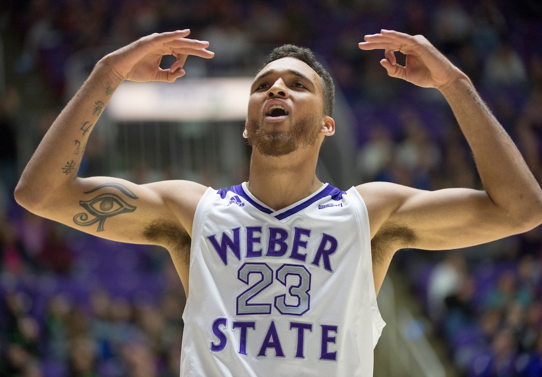 (Rick Egan  |  The Salt Lake Tribune)       Weber State Wildcats forward Brekkott Chapman (23) celebrates after sinking a 3-point shot giving the Wildcats a 13 point lead in the second half,  in basketball action between Brigham Young Cougars and Weber State Wildcats, at the Dee Event Center in Ogden, Saturday, Dec. 1, 2018.