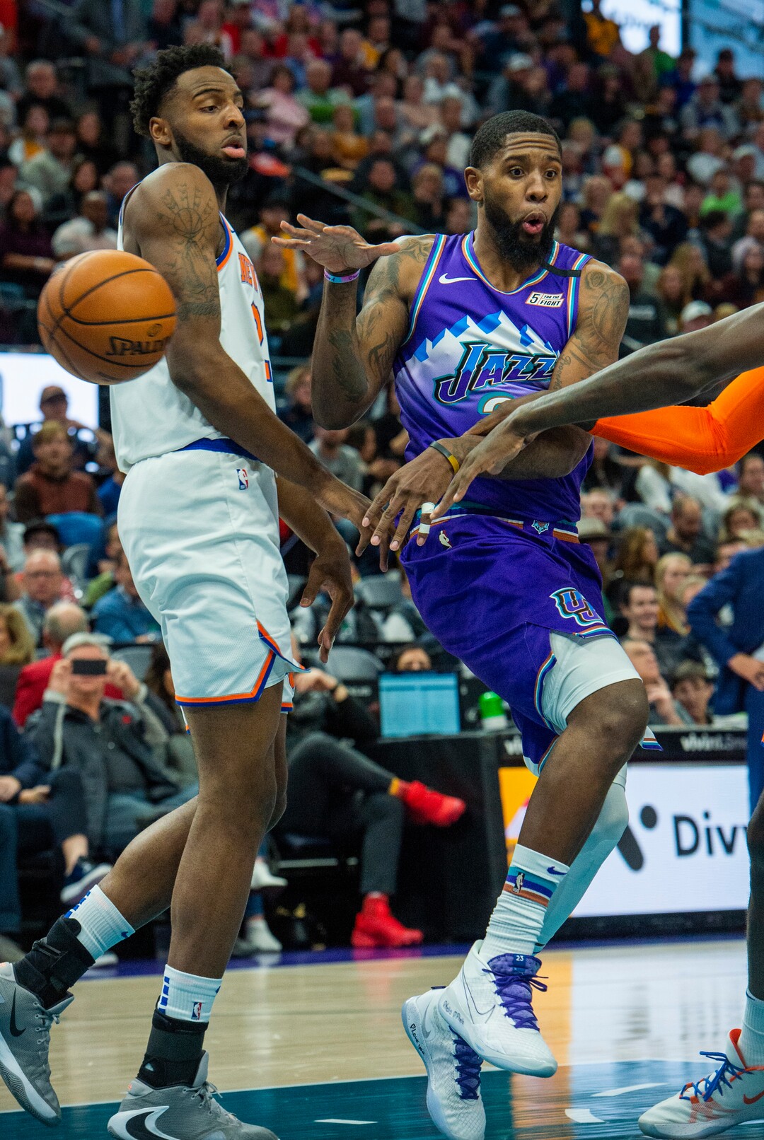 (Rick Egan  |  The Salt Lake Tribune)   Utah Jazz forward Royce O'Neale (23) dishes off a no-look pass for a Rudy Gobert (27), in NBA action between the Utah Jazz and the New York Knicks, in Salt Lake City, Wednesday, Jan. 8, 2020.