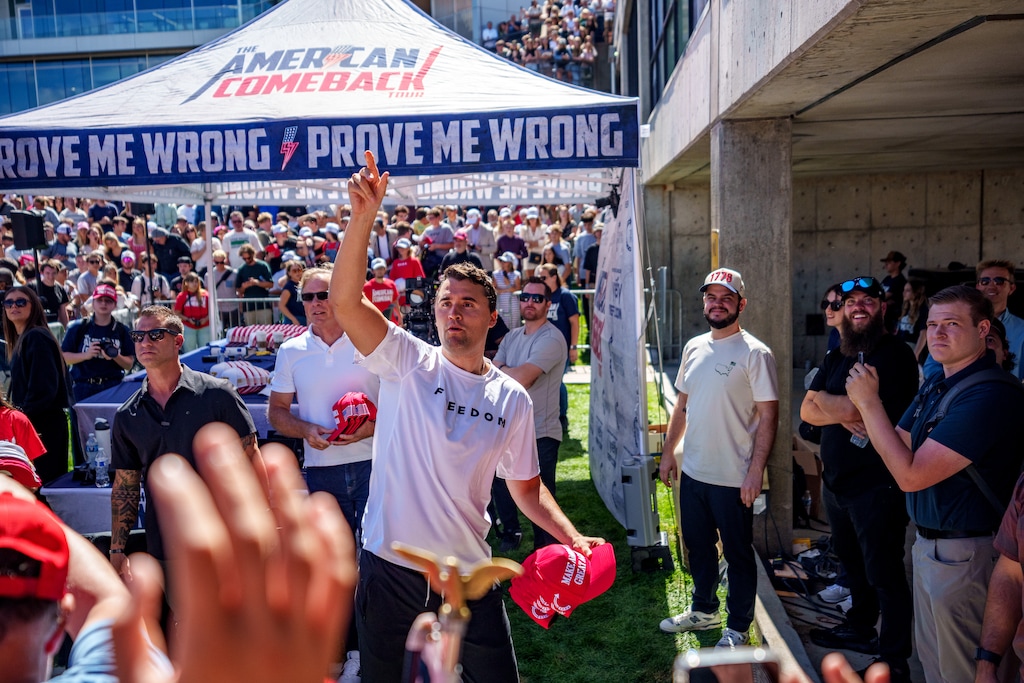 (Trent Nelson | The Salt Lake Tribune) Charlie Kirk throws hats to the crowd after arriving at Utah Valley University in Orem on Wednesday, Sept. 10, 2025. He was fatally shot shortly after the event started. Kirk had previously been on campus at UVU in 2019 and at the University of Utah in 2024.