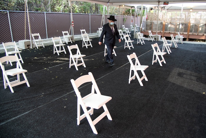(Francisco Kjolseth  |  The Salt Lake Tribune) Rabbi Benny Zippel goes over safety set up plans with outdoor tents on Thursday, Sept. 17, 2020, for High Holy Day services, which begin Friday evening, so members of Chabad Lubavitch can meet in person, outside and socially distanced through the weekend.