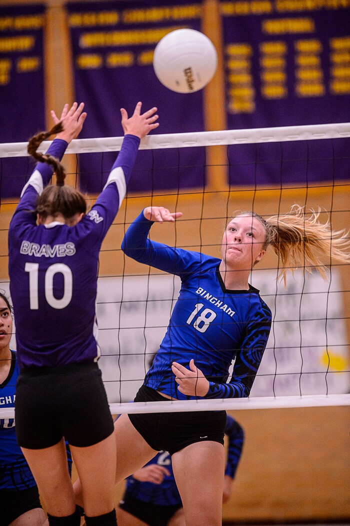 (Trent Nelson  |  The Salt Lake Tribune)  Bingham's Olivia Boudreaux (18) spikes the ball as North Summit hosts Bingham, high school girls' volleyball in Coalville, Thursday August 17, 2017.