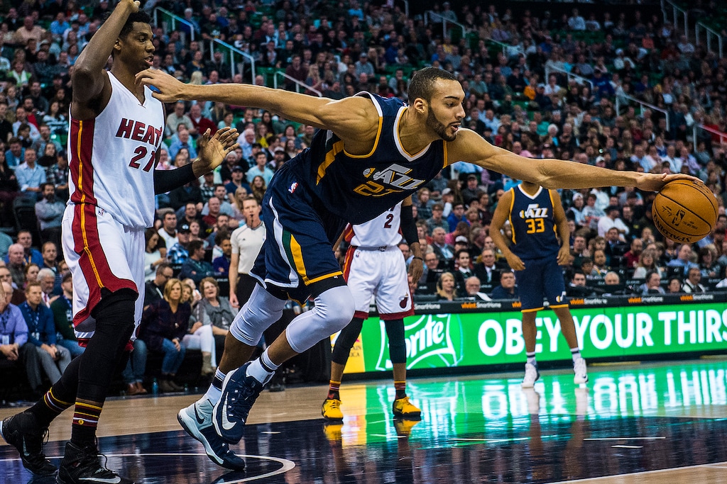 Chris Detrick  |  The Salt Lake TribuneUtah Jazz center Rudy Gobert (27) gets a rebound past Miami Heat center Hassan Whiteside (21) during the game at Vivint Smart Home Arena Thursday December 1, 2016. 