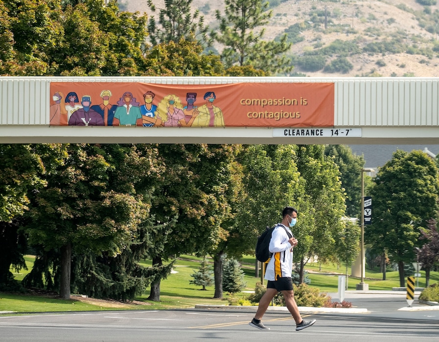 (Leah Hogsten | The Salt Lake Tribune) A Brigham Young University student walks on campus on Sept. 16, 2020. The school announced that masks will be required for the 2021-2022 school year.