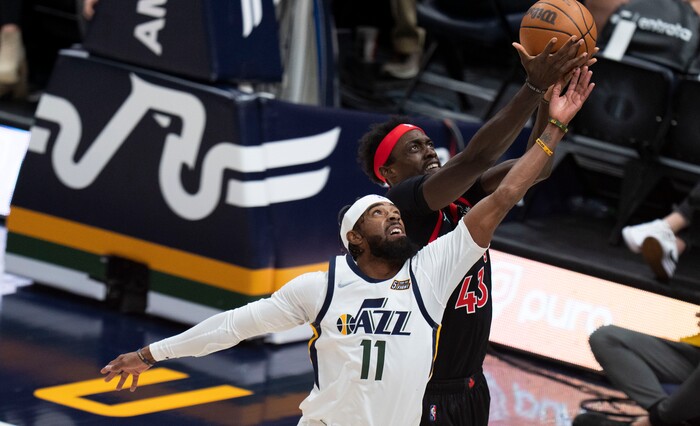 (Rick Egan | The Salt Lake Tribune) Utah Jazz guard Mike Conley (11) goes for the ball along with Toronto Raptors forward Pascal Siakam (43), in NBA action between Utah Jazz and Toronto Raptors, at Vivint Arena, in Salt Lake City, on  Thursday, Nov. 18, 2021.