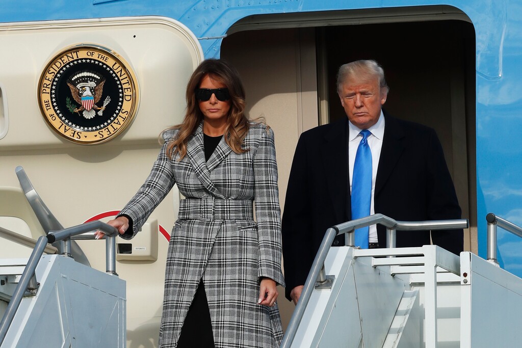 (Keith Srakocic | AP Photo) President Donald Trump, right, departs Air Force One as he arrives with first lady Melania Trump on Tuesday, Oct. 30, 2018 in Coraopolis, Pa. The Trumps came to Pittsburgh honor the victims of the deadly shooting at a synagogue in Pittsburgh's Squirrel Hill neighborhood on Saturday.