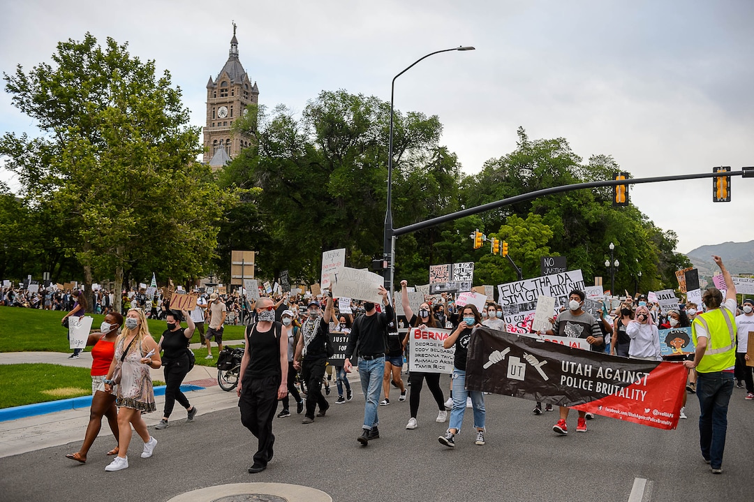 (Trent Nelson  |  The Salt Lake Tribune) People march against police brutality in Salt Lake City on Saturday, June 13, 2020.