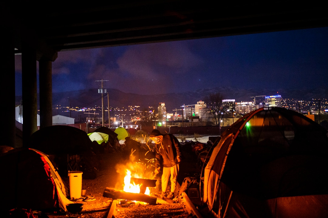 (Rick Egan | The Salt Lake Tribune) Homeless seek shelter under the freeway after being moved from the Rio Grande area earlier this week, Saturday, Dec. 12, 2020.