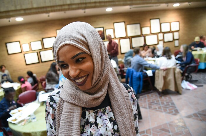 (Francisco Kjolseth  |  The Salt Lake Tribune)  Masagid Abdalla a refugee from Sudan discusses her dream of becoming a dentist, currently enrolled at Salt Lake Community College while helping support her family. Abdalla was one of the recipients of a certificate of achievement during the Women of the World 8th annual award ceremony at the Salt Lake County building in Salt Lake City on Saturday, Dec. 8, 2018. The event is a celebration of successes including educational, service, and employment milestones by refugee women.
