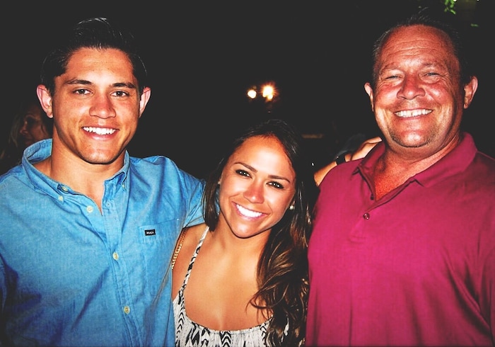 (Courtesy of Lo'eau LaBonta) Royals midfielder Lo'eau LaBonta (center) and her brother Kalaukoa (left) were raised by their father Mark (right) in Southern California.
