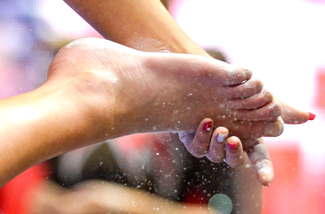 (Leah Hogsten  |  The Salt Lake Tribune) Abby Paulson chalks her feet prior to her routine on the beam as the University of Utah fifth-ranked gymnastics team hosts No. 12 University of Kentucky during its home opener, Jan. 3, 2020, at the Huntsman Center.