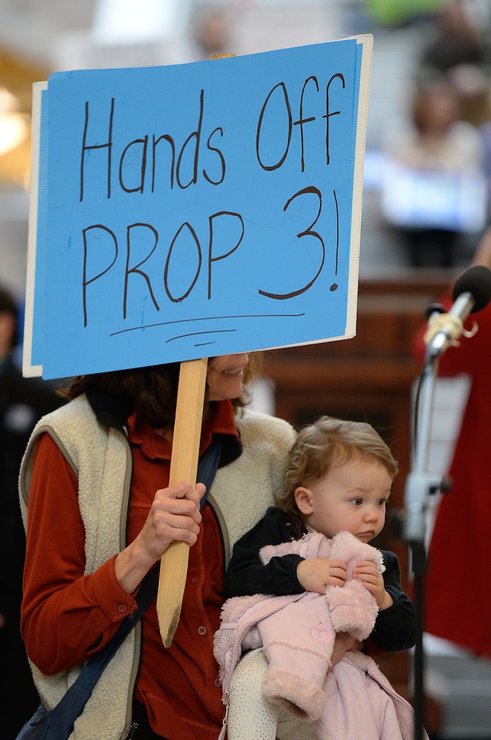 (Francisco Kjolseth  |  The Salt Lake Tribune)  Gaylynn Bennion holds Ashlynn, 20-months, at the Capitol rotunda on Monday, Jan, 28, 2019, on the first day of the Legislative session to rally in support of protecting Proposition 3, the Medicaid Expansion law recently passed by voters.