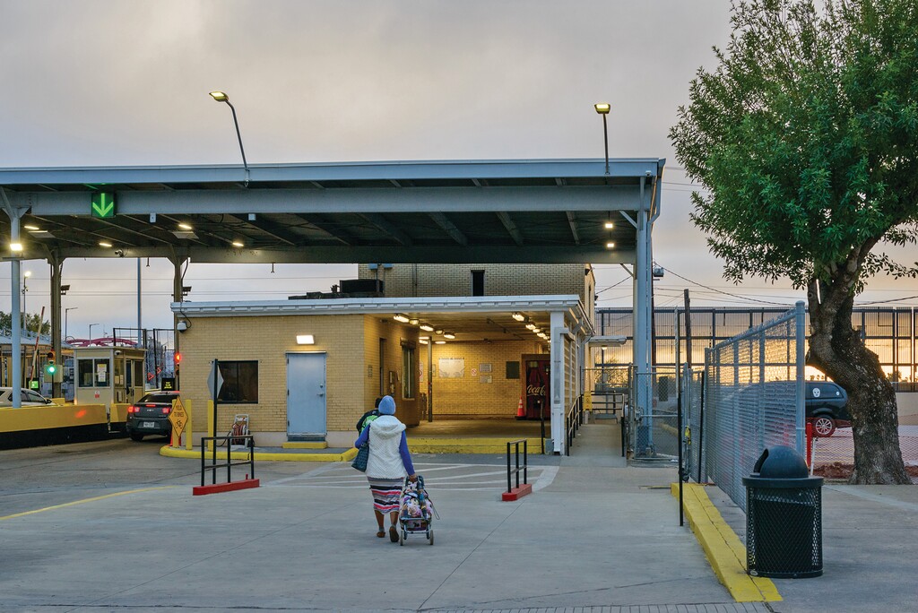 A person walks toward a border crossing checkpoint at the U.S.-Mexico border in Brownsville, Texas, on Jan 25, 2025. (Mike Osborne/The New York Times)