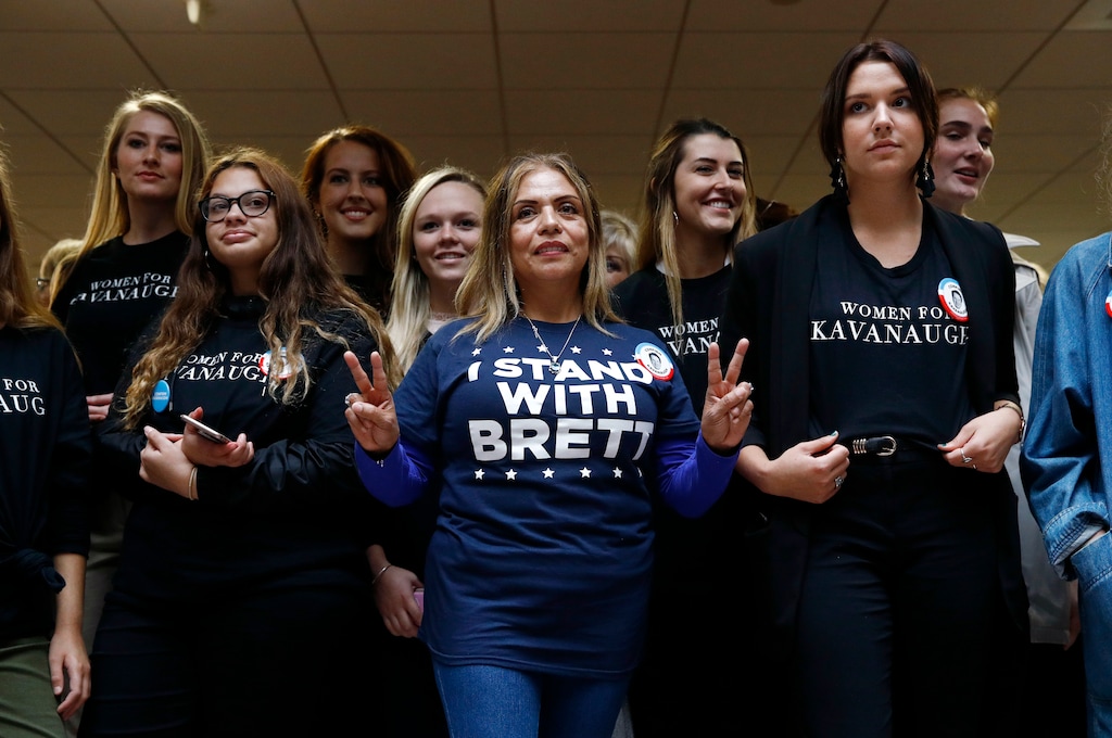 (Patrick Semansky | The Associated Press) Supporters of Supreme Court nominee Brett Kavanaugh gather inside the Hart Senate Office Building on Capitol Hill in Washington, Thursday, Sept. 27, 2018. The Senate Judiciary Committee is hearing from Christine Blasey Ford, the woman who says Kavanaugh sexually assaulted her.