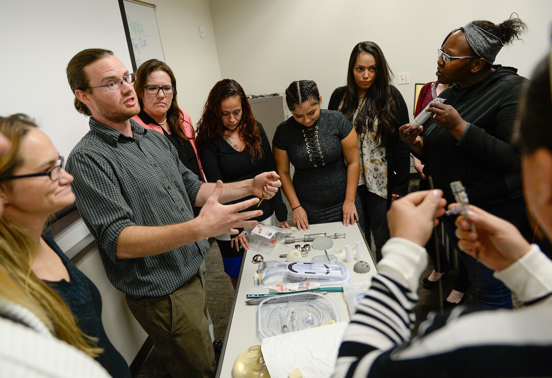 (Francisco Kjolseth  |  The Salt Lake Tribune)  Kevin Buckingham with Nelson Laboratories talks about FDA regulations on medical devices during a class for single mothers participating in the Invest in You Too program, a 13-week course that helps single mothers build skills in medical manufacturing and job readiness to open the doors for employment. Currently, several students in the second cohort who are experiencing intergenerational poverty are taking steps to break the cycle. Some of the students have also experienced homelessness, domestic abuse and drug addiction.