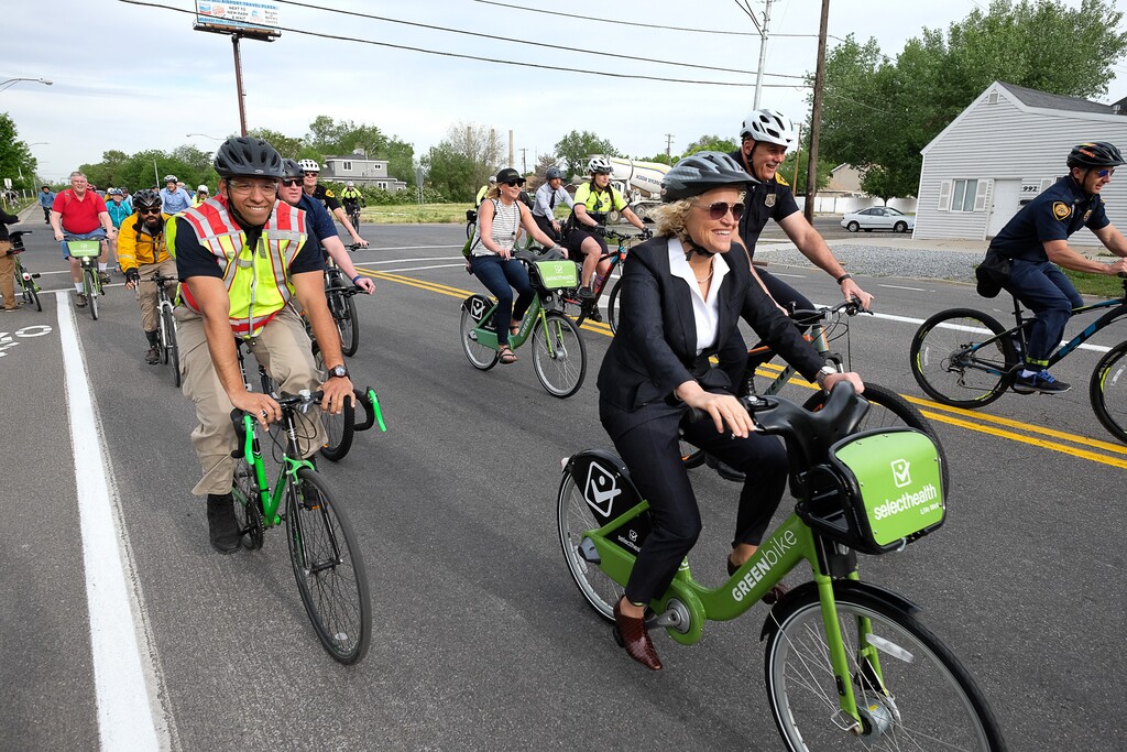 (Francisco Kjolseth  |  The Salt Lake Tribune)  Salt Lake City Mayor Jackie Biskupski, center back,  is joined by Police Chief Mike Brown, members of the public and city employees on Thursday, May 16, 2019, as part of the annual MayorÕs Bike to Work Day. This yearÕs ride began at the Northwest Recreation Center and ran primarily along the Jordan River Trail in an effort to show off the investments the city and others have made to the trail.