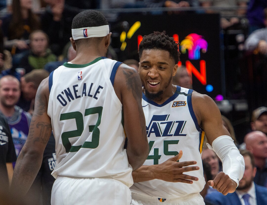 (Rick Egan  |  The Salt Lake Tribune) Utah Jazz guard Donovan Mitchell (45) celebrates after Utah Jazz forward Royce O'Neale (23)stole an inbound pass and was found as he went to the hoop, in NBA action between the Utah Jazz and the Washington Wizards, in Salt Lake City, Friday, February 28, 2020