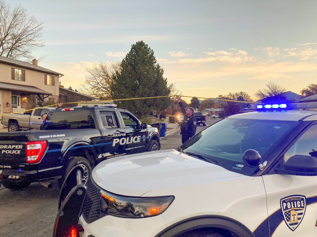 (Chris Samuels | The Salt Lake Tribune) Police investigate a scene on Quailstone Drive where a suspect fired several shots at an officer in Taylorsville, Thursday, Nov. 4, 2021.