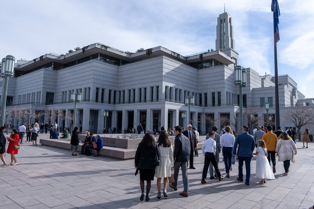 (Rick Egan | The Salt Lake Tribune) LDS faithful walk to the Conference Center for the morning session of LDS General Conference on Saturday, April 2, 2022.
