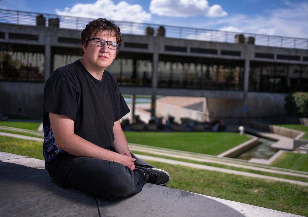(Francisco Kjolseth | The Salt Lake Tribune) Utah Valley University student Hunter Kozak, who asked the question Charlie Kirk was answering as the commentator was killed at the school last year during a Turning Point USA event, sits for a portrait on Wednesday, Sept. 2, 2026, in the courtyard where the shooting unfolded.