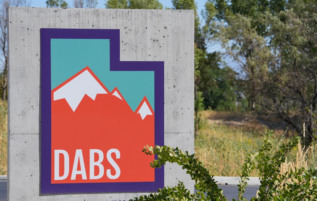 (Chris Samuels | The Salt Lake Tribune) A sign for the Department of Alcoholic Beverage Services outside a state liquor store in Taylorsville, Thursday, July 31, 2025. Jeppson’s Malört is now distributed in Utah.