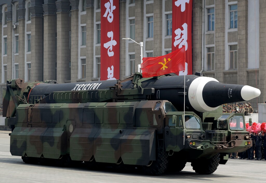 In this April 15, 2017 file photo, North Korea's Hwasong-10 missile is paraded across Kim Il Sung Square during a military parade in Pyongyang.  North Korea said the medium long-range strategic missile it tested over the weekend can carry a nuclear warhead. The country's official Korean Central News Agency said the missile fired Sunday, May 14, 2017,  Korea time was a Hwasong-12 "capable of carrying a large-size heavy nuclear warhead." (AP Photo/Wong Maye-E)
