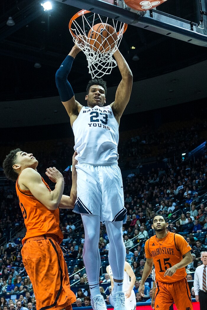 (Chris Detrick  |  The Salt Lake Tribune)  Brigham Young Cougars forward Yoeli Childs (23) dunks past Idaho State Bengals forward Kyle Ingram (35) during the game at the Marriott Center Thursday, December 21, 2017.  
