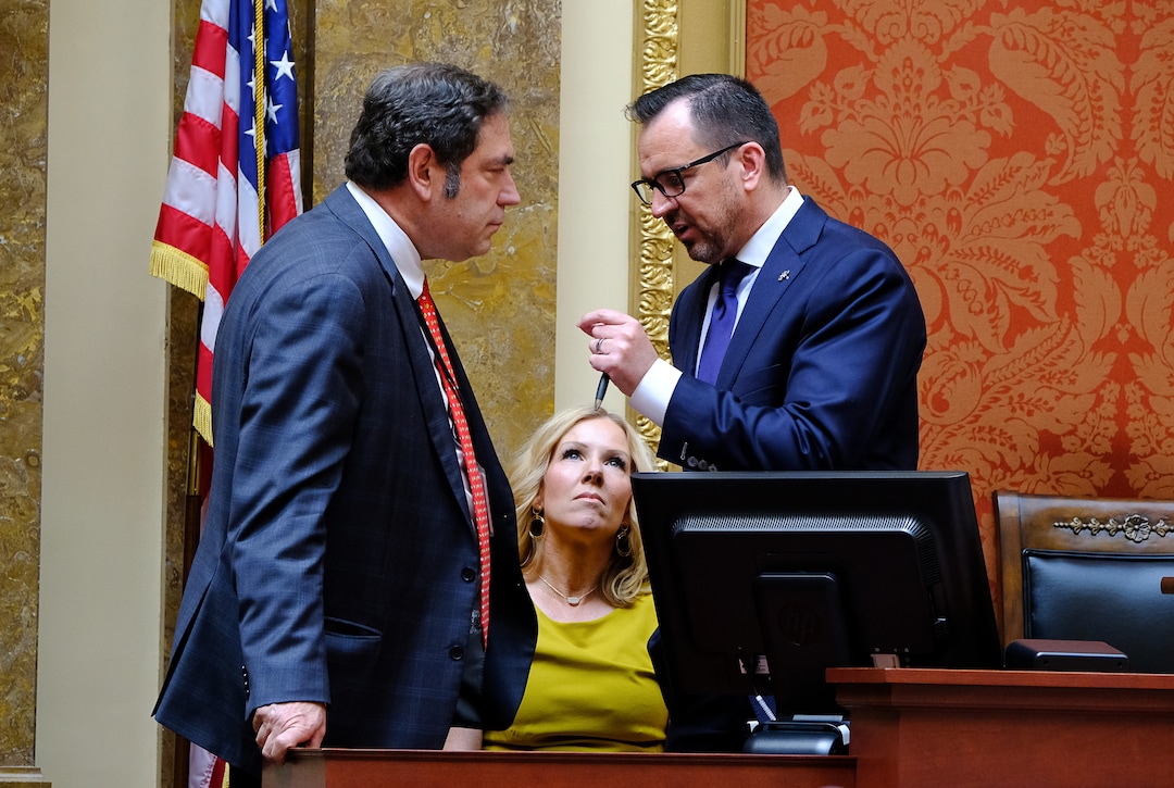 (Francisco Kjolseth  |  The Salt Lake Tribune)  Rep. Brian King, D-Salt Lake, speaks with House speaker Greg Hughes as Hughe's wife Krista listens in. The Legislature called itself into special session to attempt to override Gov. Gary Herbert's vetoes of two bills. 